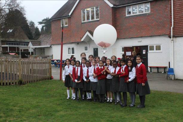 The first group of prep-school children prepare to launch their balloon in the follow-on Challenge at Epsom.